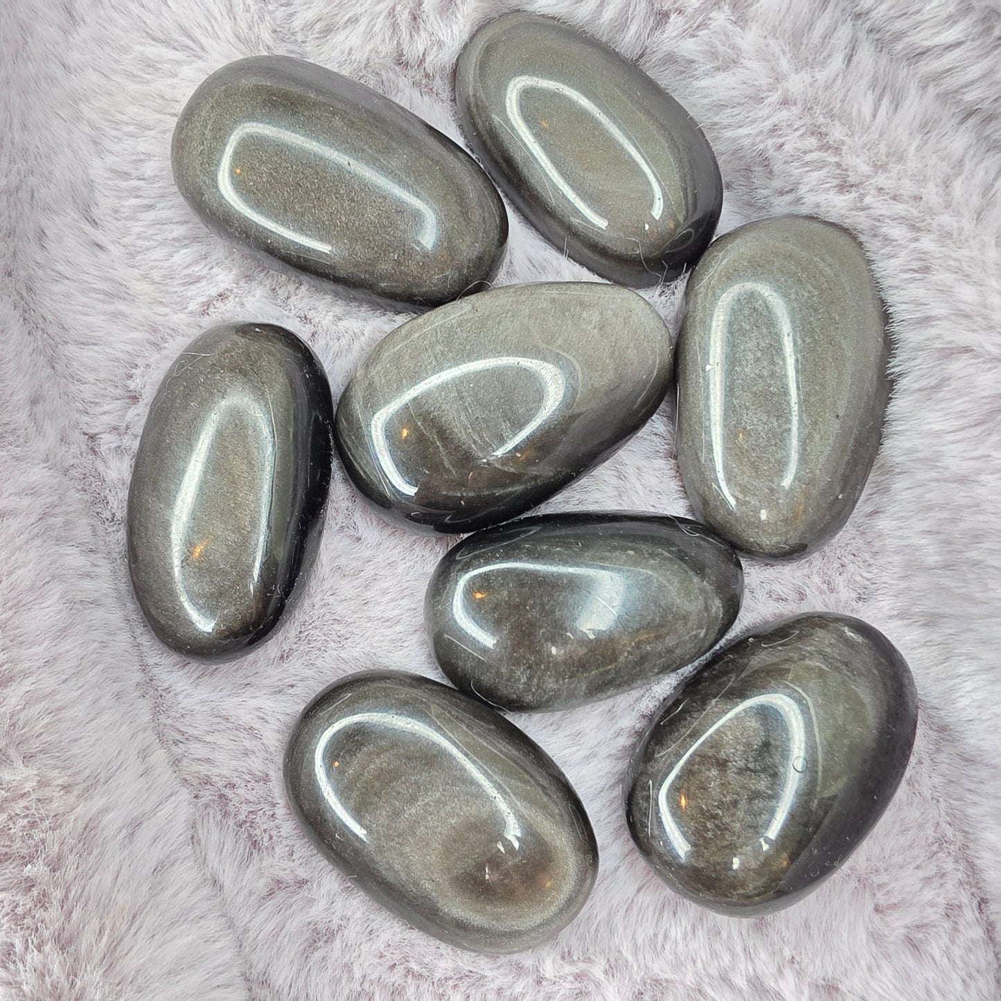 Hopeaobsidiaani kämmenkivi