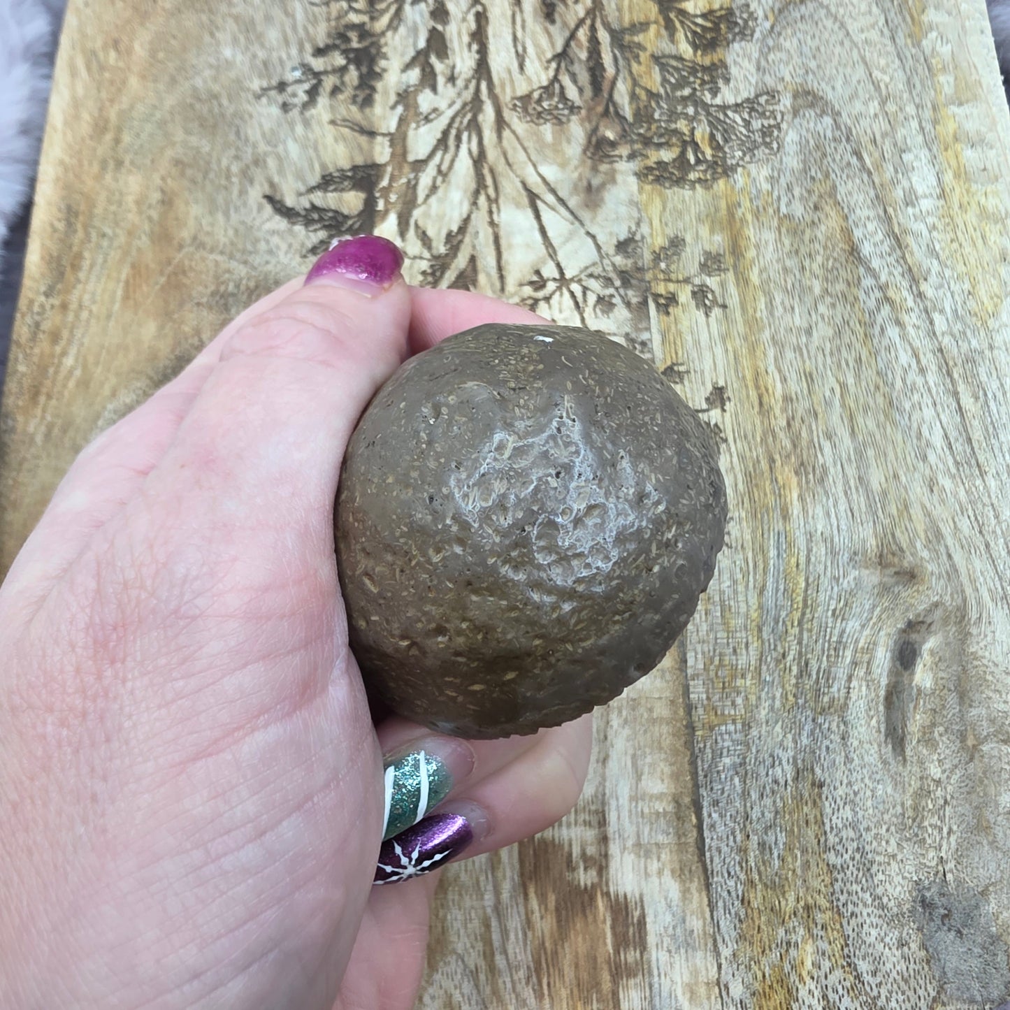 Akaattigeodin puolikas